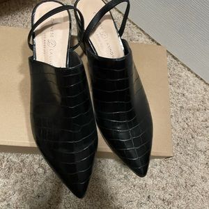 Slight heel with open back out